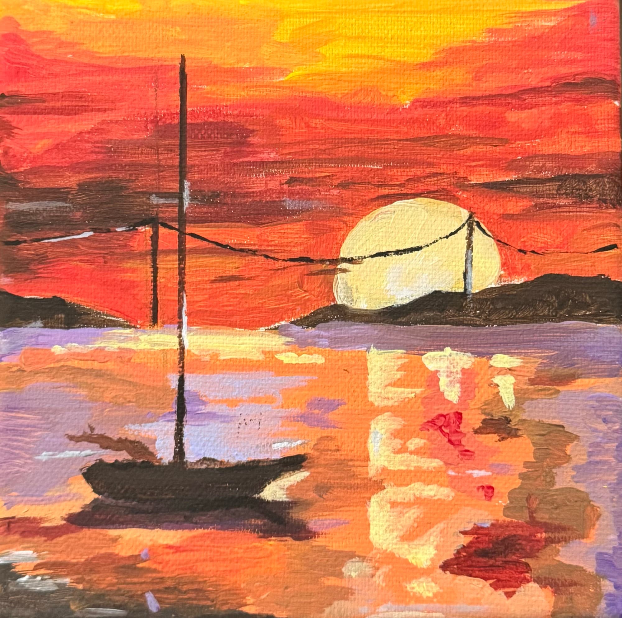 Sunset over the sea: a large pale sun, orange and red skies, a dark boat with a mast, and violet-orange reflections on the water